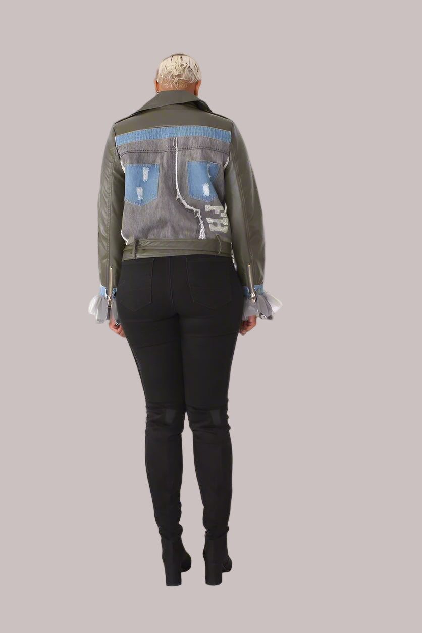Back view of army green faux leather moto jacket with denim patchwork sleeve accents and playful tulle cuffs.