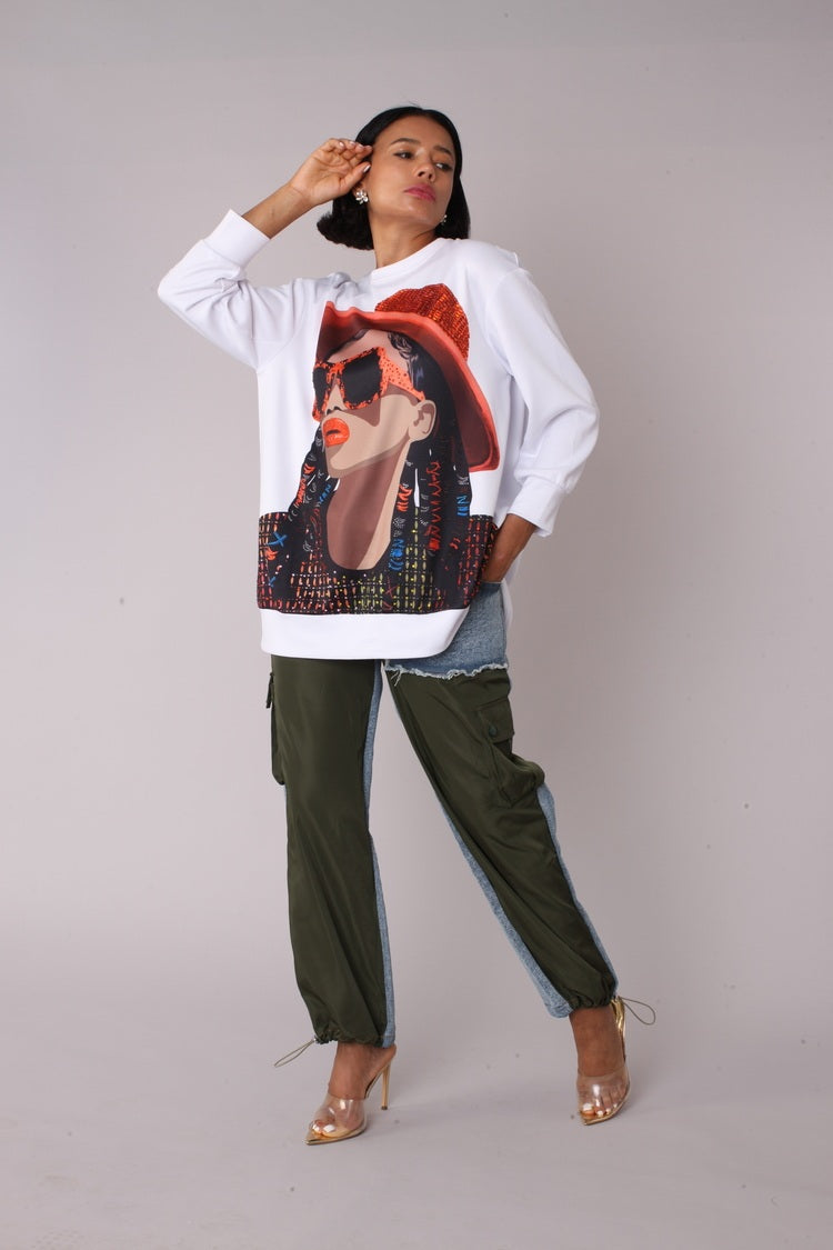 Alternate front pose of model wearing the white artistic portrait graphic long sleeve t shirt emphasizing artistic print and comfortable silhouette by For Her NYC