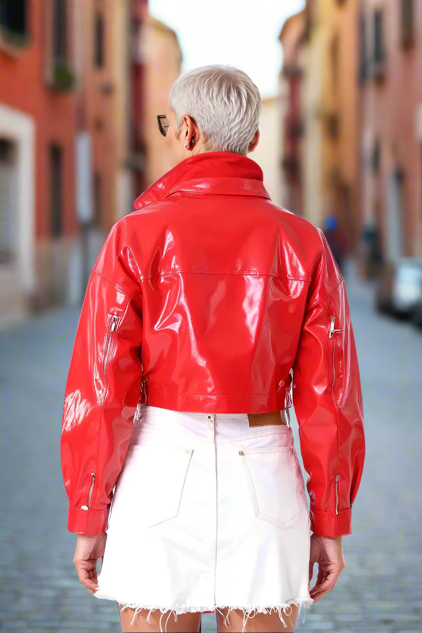 Back view street style shot of glossy cropped red vinyl jacket – For Her NYC