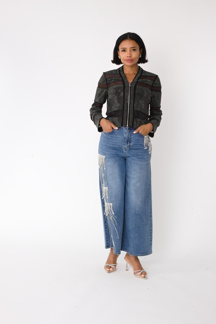 Front view of model wearing the denim crystal cascade wide leg jeans in an alternate stance, emphasizing vintage wash and statement rhinestone design by For Her NYC