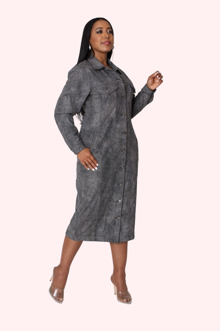 Three quarter profile view of model wearing the black denim crystal embellished midi dress, highlighting button front design, structured fit, and allover crystal detailing by For Her NYC