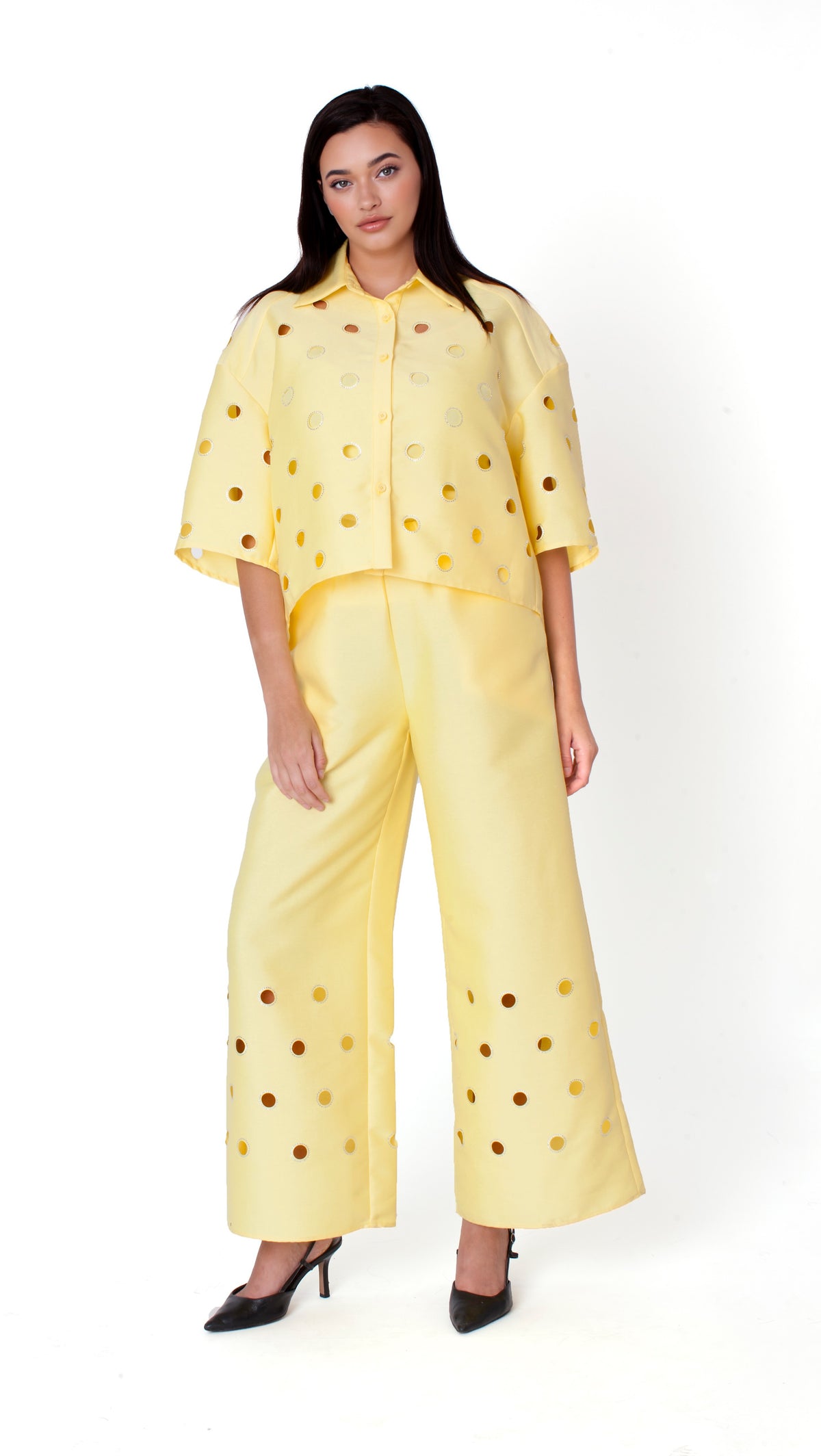 Yellow cutout grommet cropped button-down top with bold detailing and relaxed silhouette front view – For Her NYC