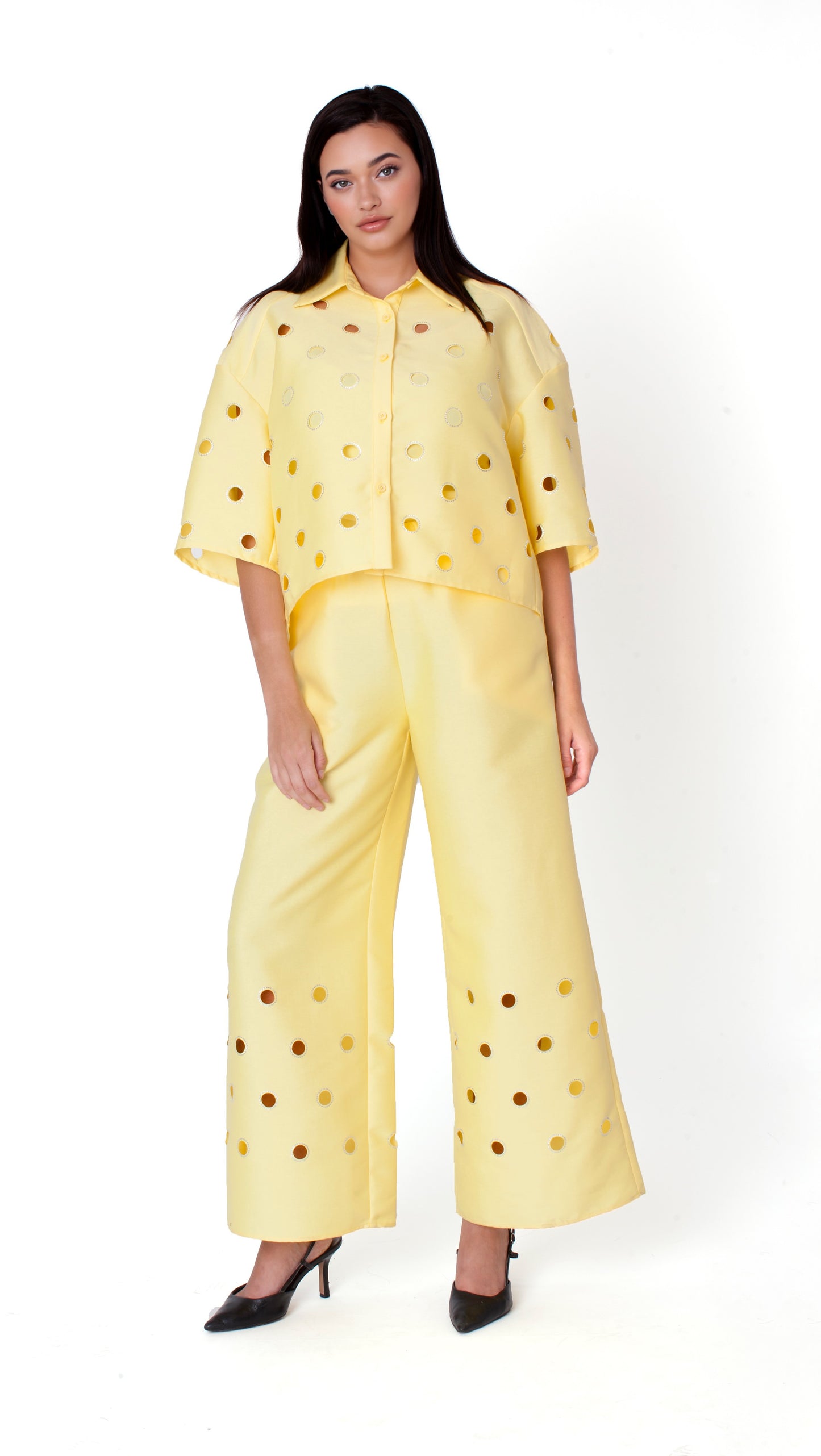 Yellow cutout grommet cropped button-down top with bold detailing and relaxed silhouette front view – For Her NYC