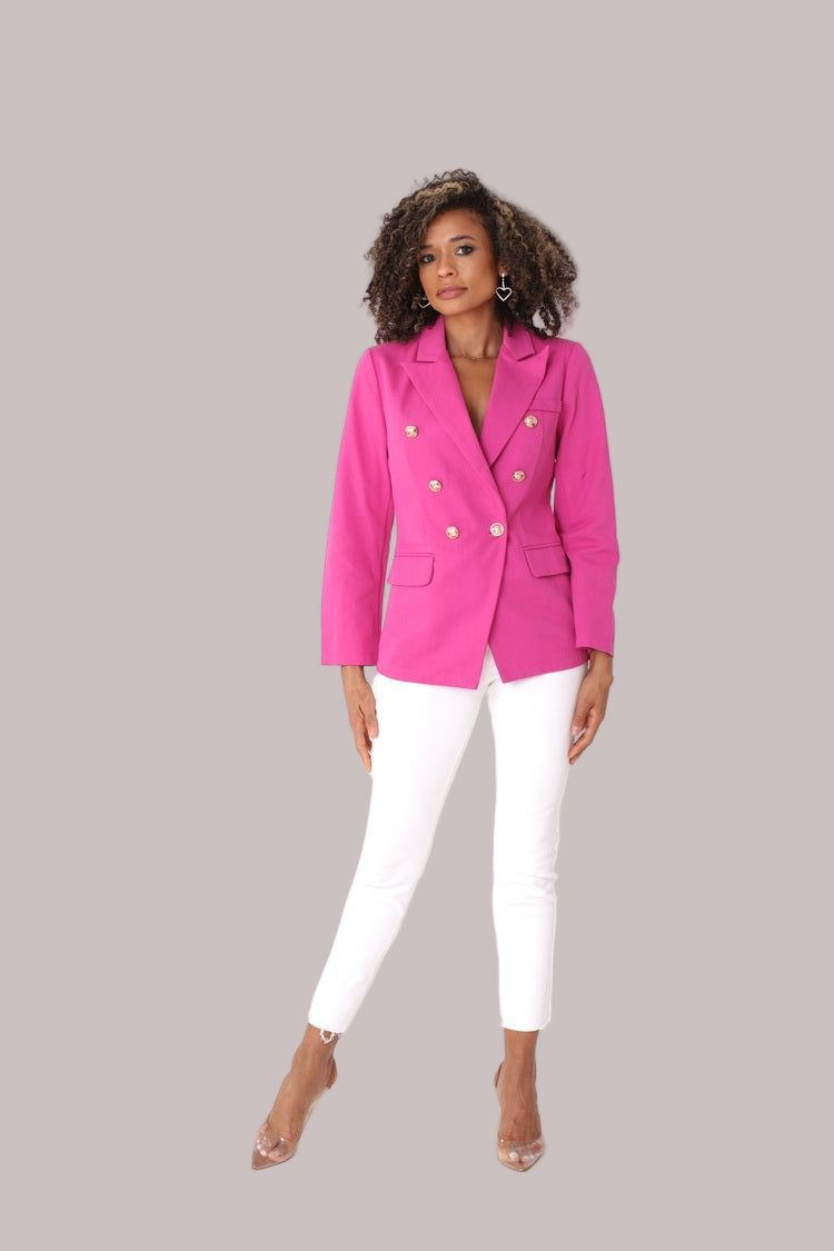Fuchsia double-breasted blazer shown from the front in a full-length pose, featuring gold-tone buttons and a bold tailored silhouette by For Her NYC