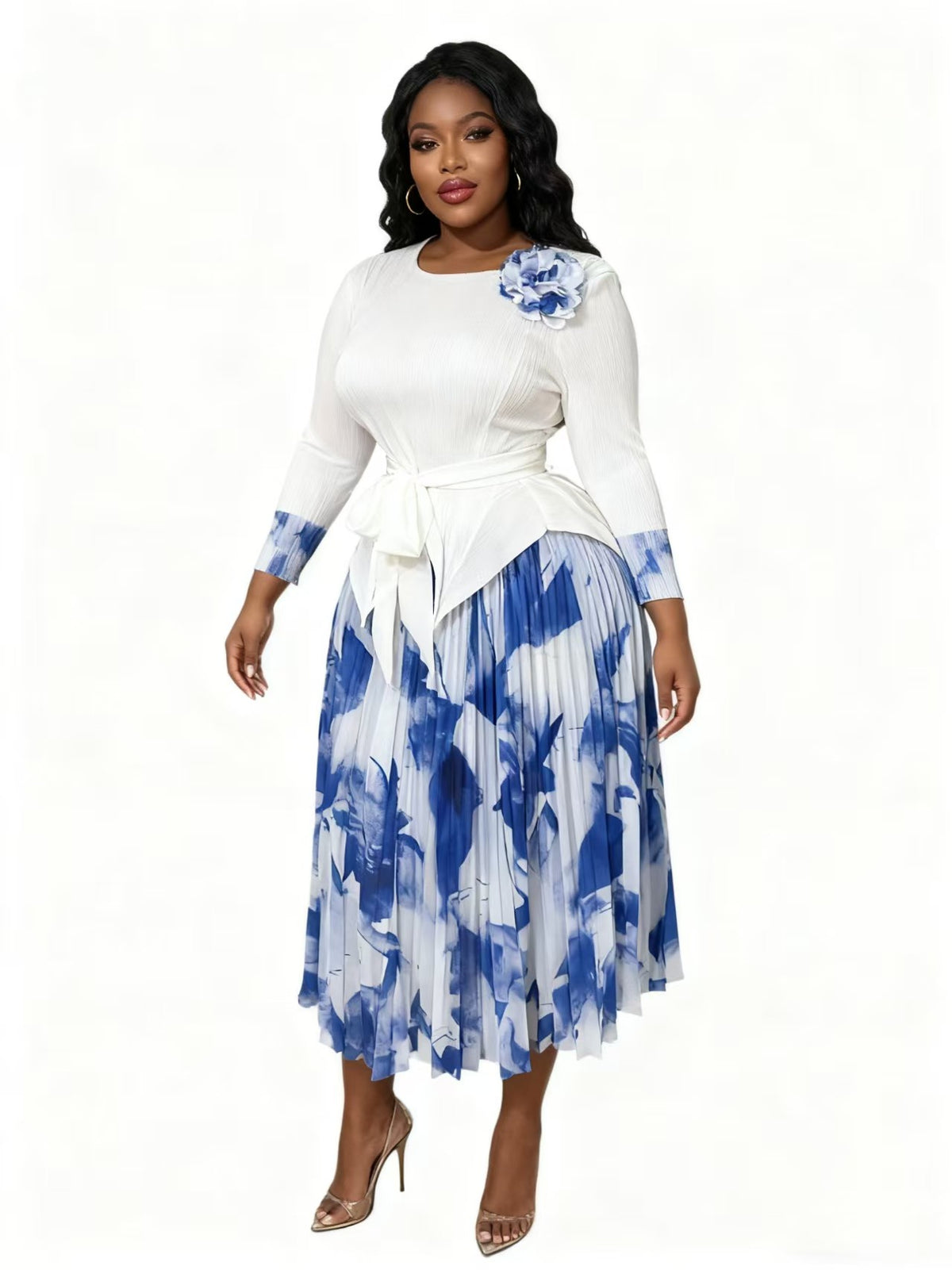 Front view of model wearing a white textured top with blue floral pleated midi skirt set, For Her NYC