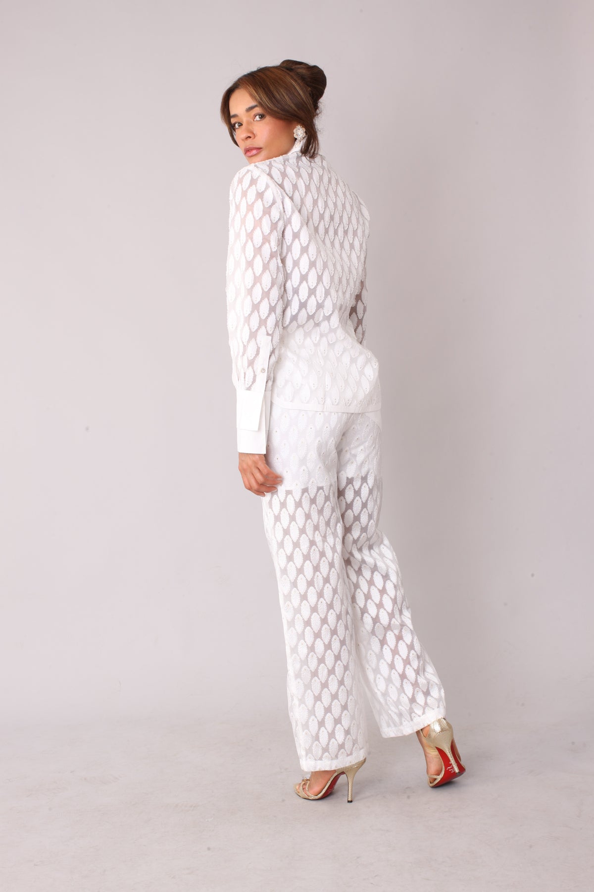 White eyelet tulle top with feather pattern shown in side profile highlighting sheer tulle fabric, For Her NYC