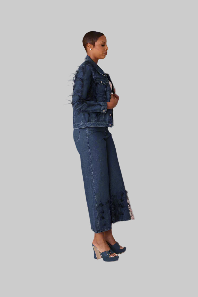 Blue feather trim denim jacket shown in side profile highlighting dramatic feather embellishments, For Her NYC