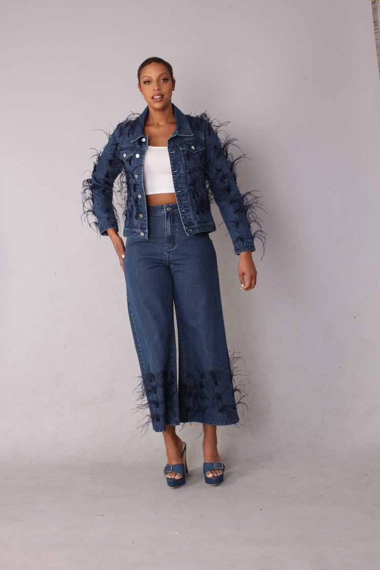 Blue denim wide leg jeans with feather trim shown full body front view styled as a statement look, For Her NYC