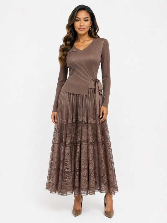 Front view of a model wearing the coffee For Her NYC Belted Lace Pleated Midi Dress - 83465 with long sleeves, a V-neckline, side-tie belt, and floral lace skirt
