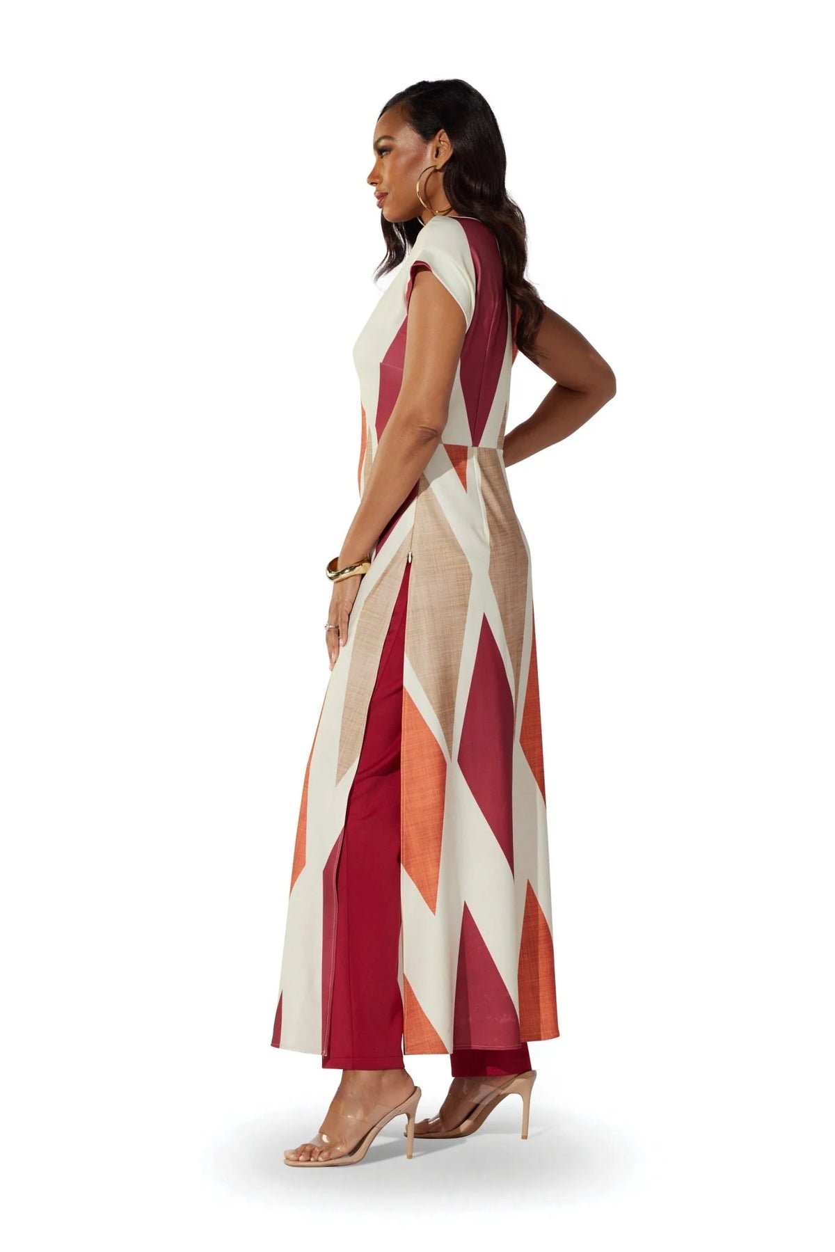 Side view of the For Her NYC Bisa Print Pantset featuring a cream, orange, red and beige geometric print tunic with coordinating pants, style S0718.