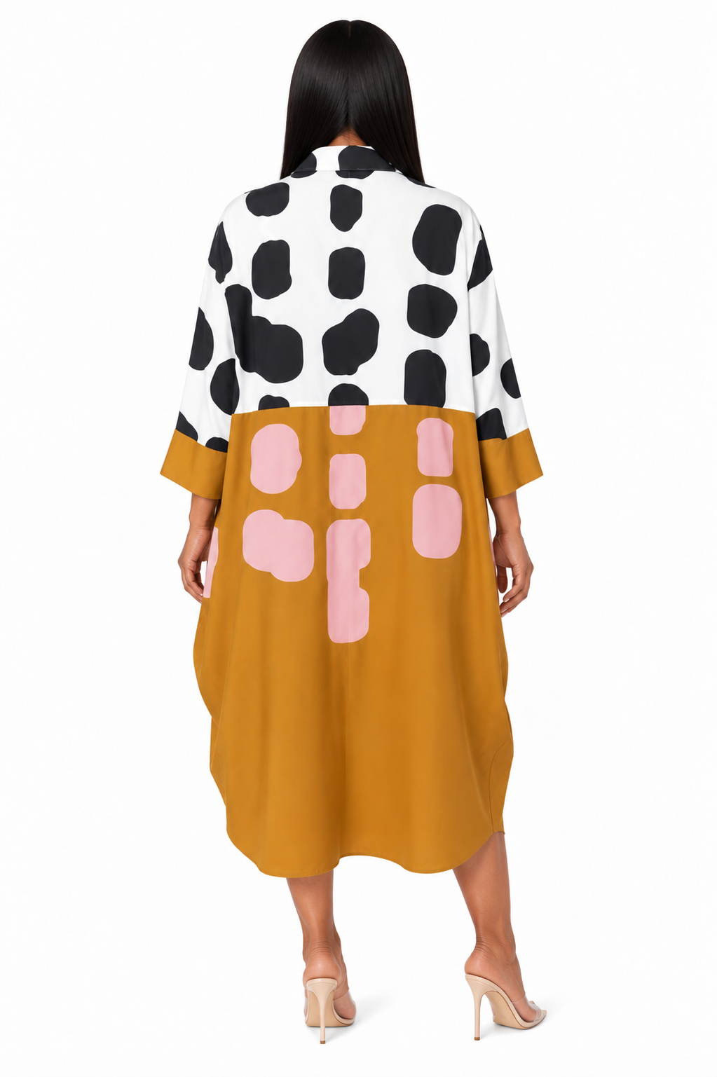 Back view of a model wearing the For Her NYC Bold Graphics Shirt Dress - S0270 in mustard yellow, white, black, and pink with an abstract print and three-quarter sleeves