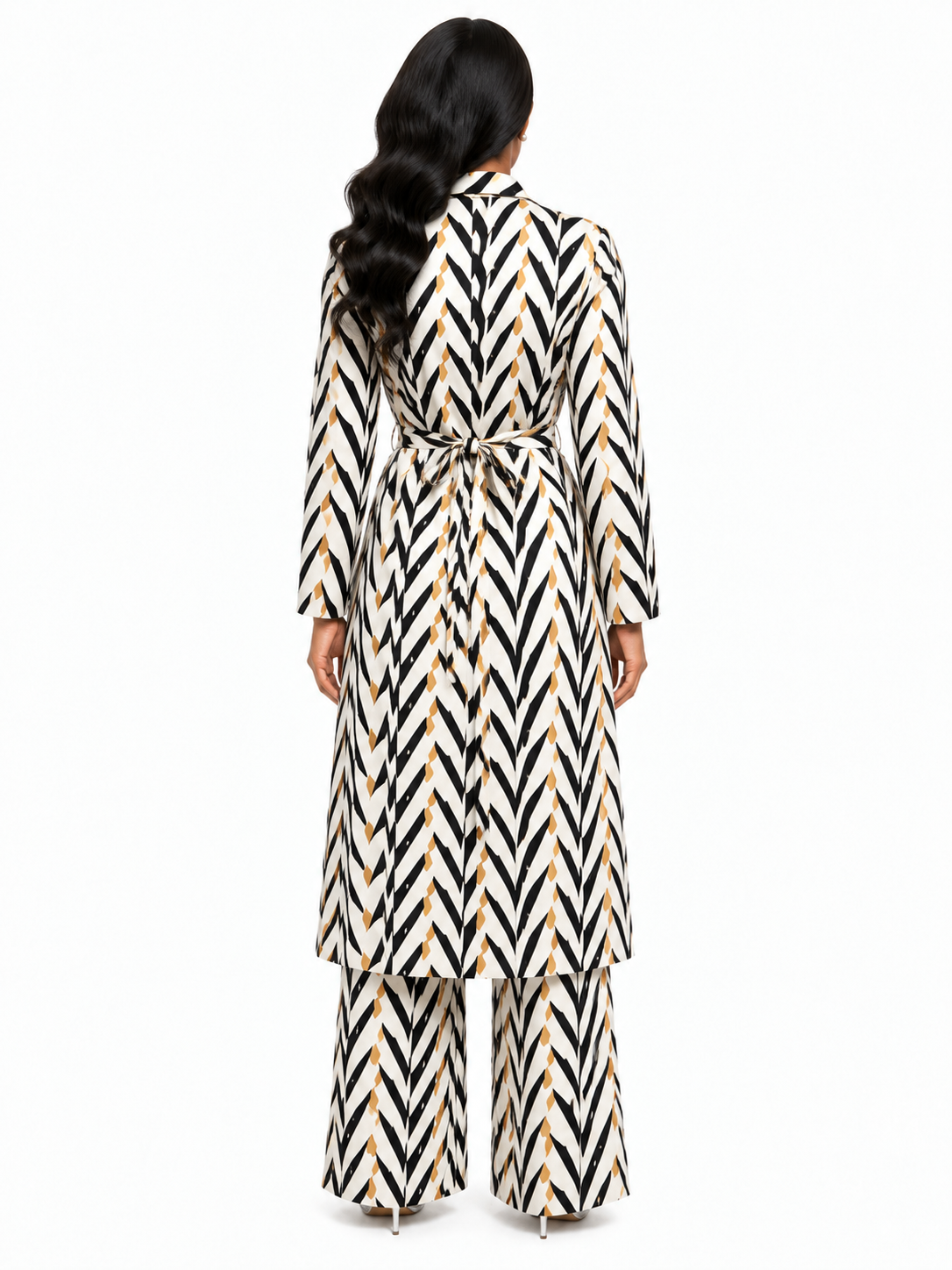 Back view of a model wearing the For Her NYC Chic Chevron Print Duster Pant Set - S0271 in black, white, and tan with a belted duster and wide-leg pants