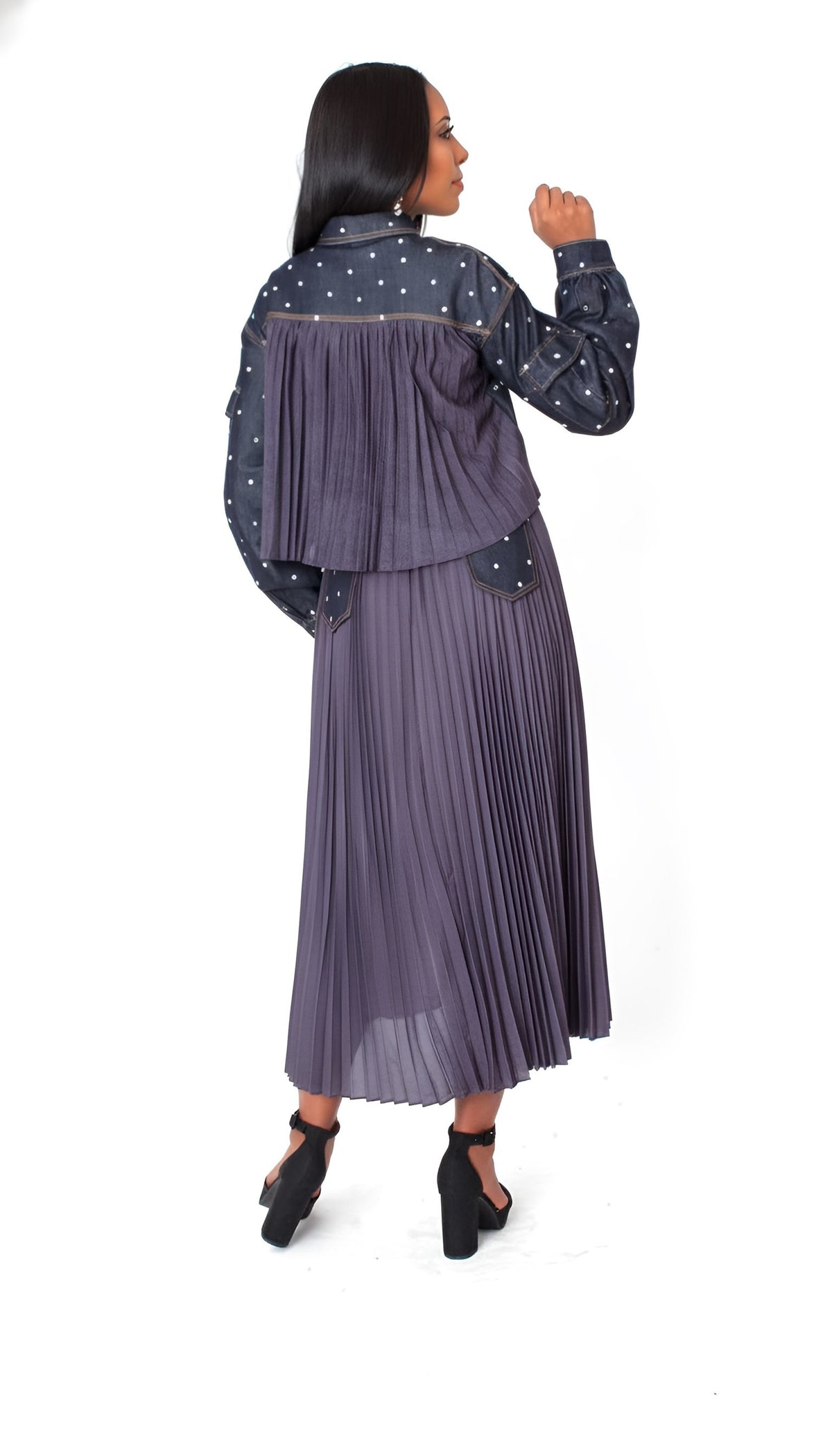 Back view of a model wearing the dark-wash For Her NYC Embellished Cropped Denim Jacket - 82962 with rhinestones and a pleated back panel
