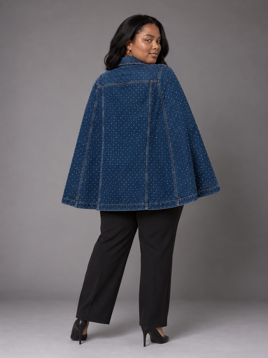 Back view of the For Her NYC Embellished Plus Size Cape Jacket featuring an allover rhinestone-studded denim design and flowing cape silhouette, style S0279W.