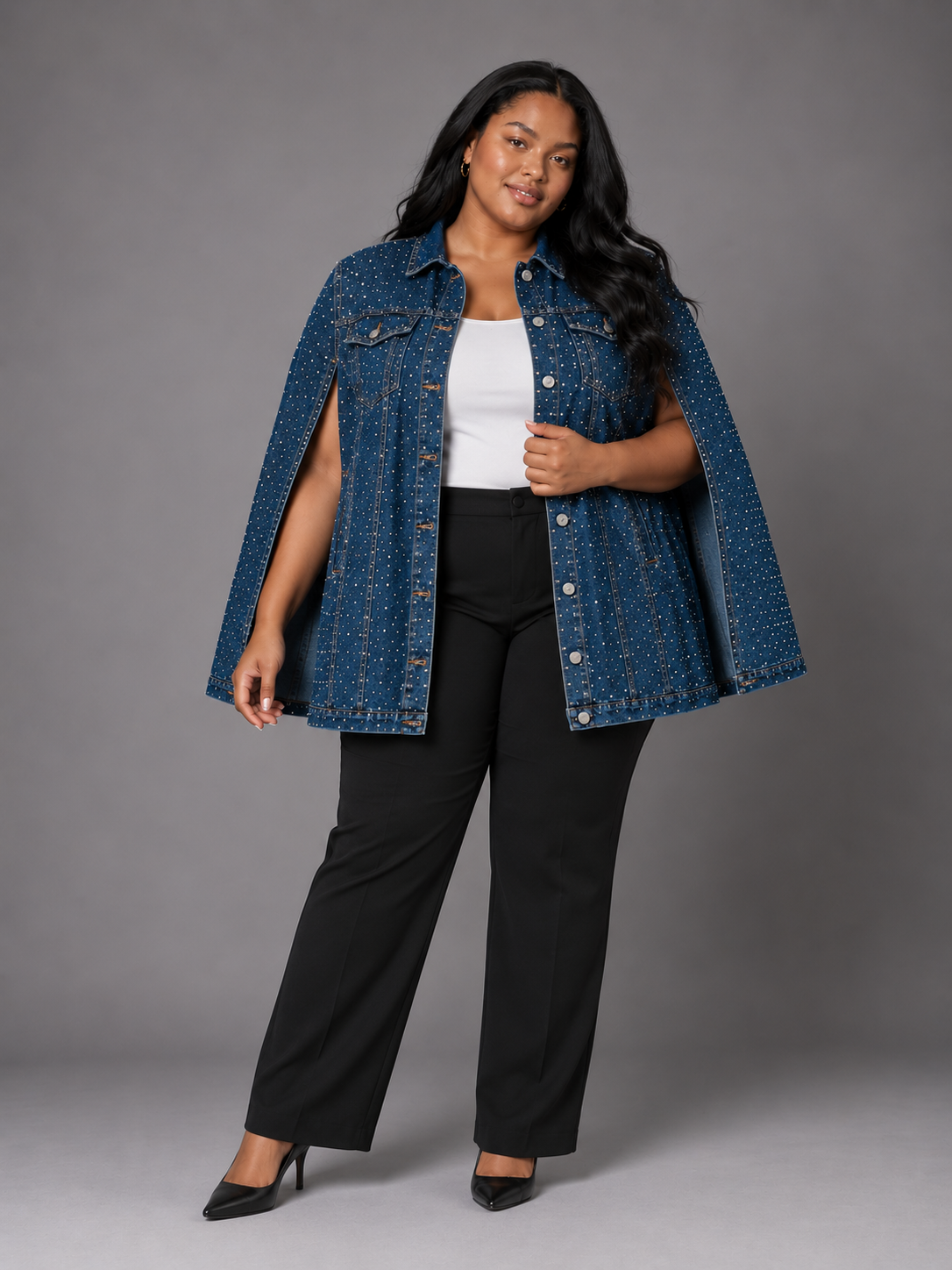 Front view of the For Her NYC Embellished Plus Size Cape Jacket featuring a rhinestone-studded denim design, button front, chest pockets and cape silhouette, style S0279W.