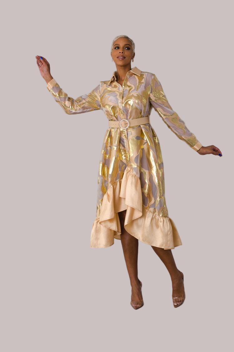 Model wearing gold metallic organza dress walking forward showing movement and shine. For Her NYC.