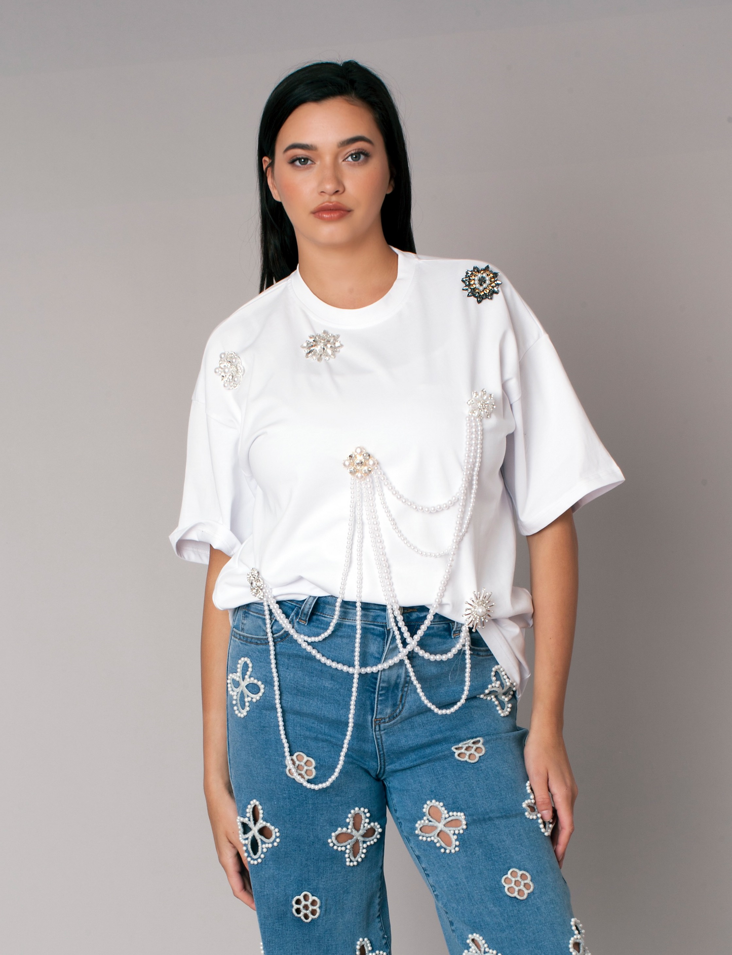 Pearl Chain Embellished Tee oversized white t-shirt with draped pearl chains styled with embellished denim jeans For Her NYC