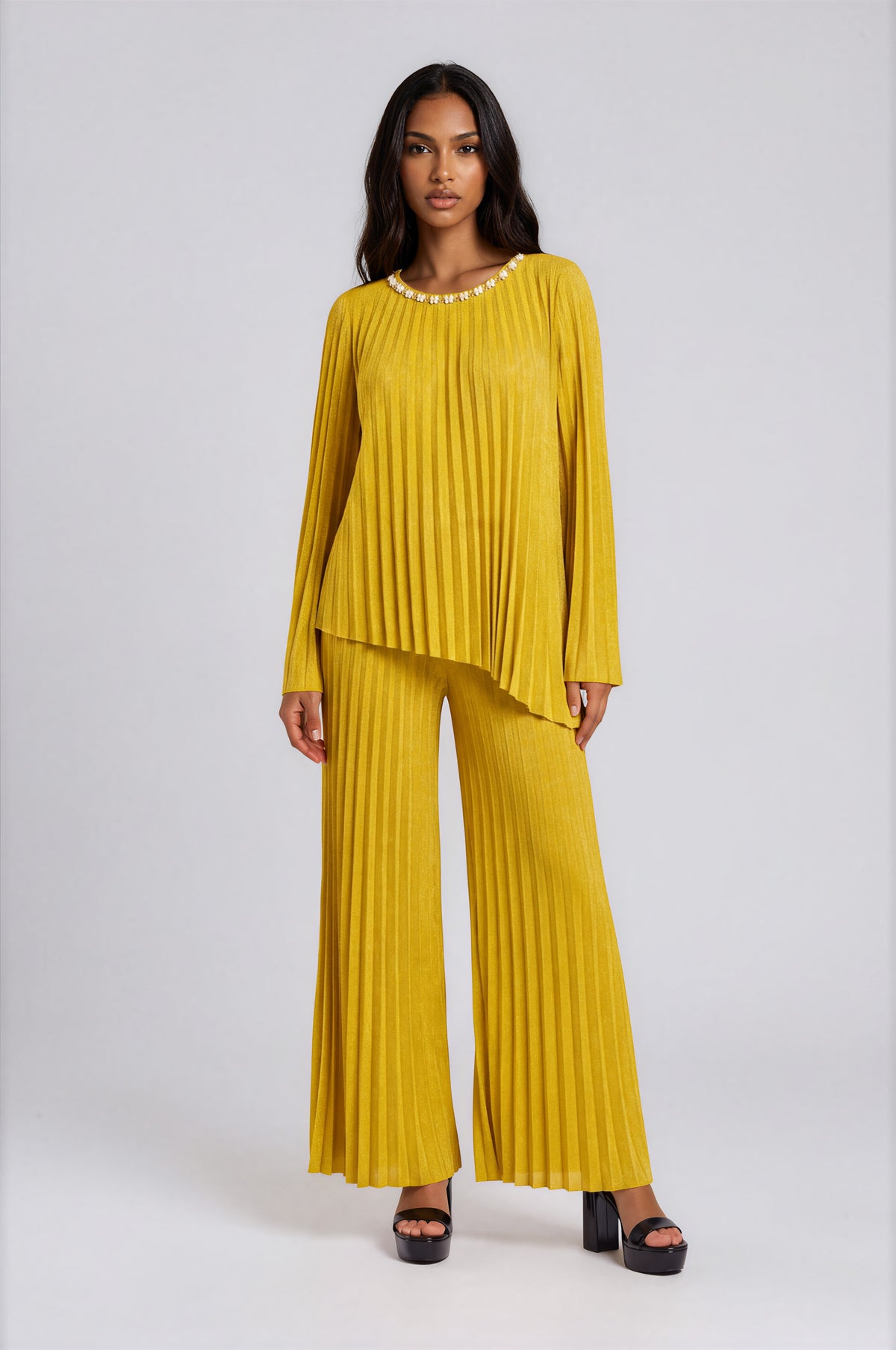 Front view of a model wearing the gold For Her NYC Pleated Top and Wide-Leg Pant Set - 83449