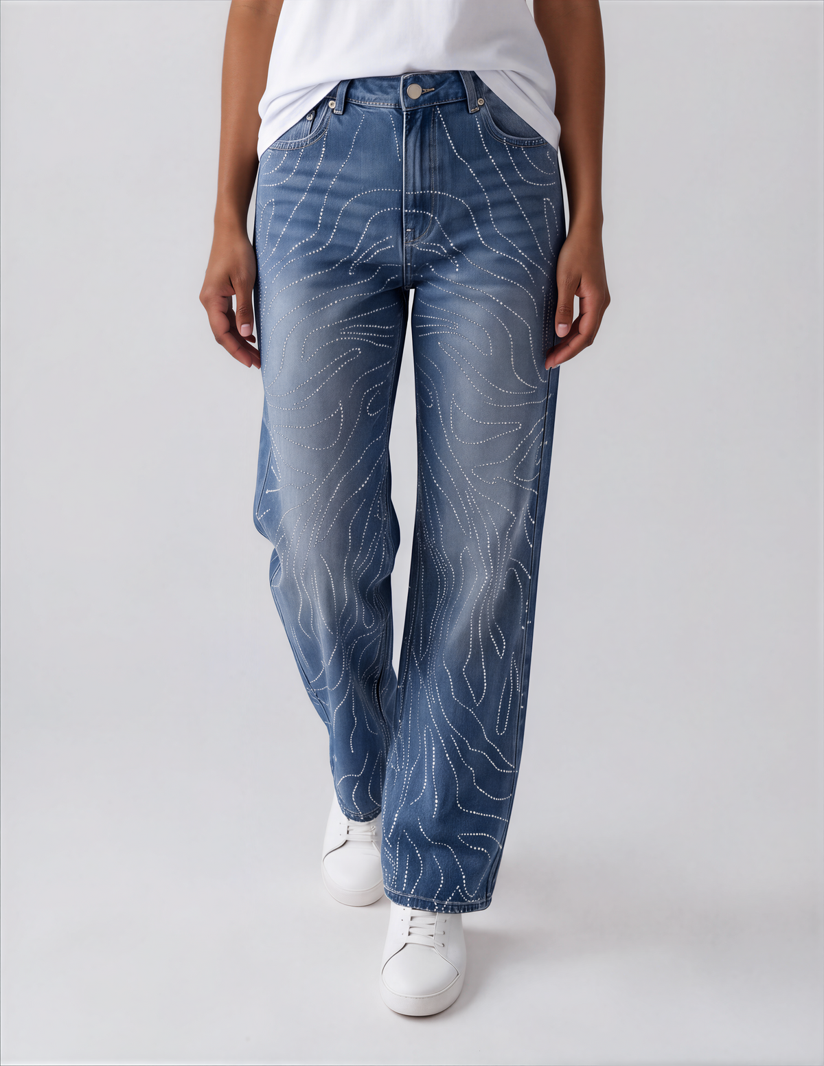 Front view of a model wearing the For Her NYC Rhinestone Swirl Wide-Leg Denim Jeans - 83071 with allover curved rhinestone detailing