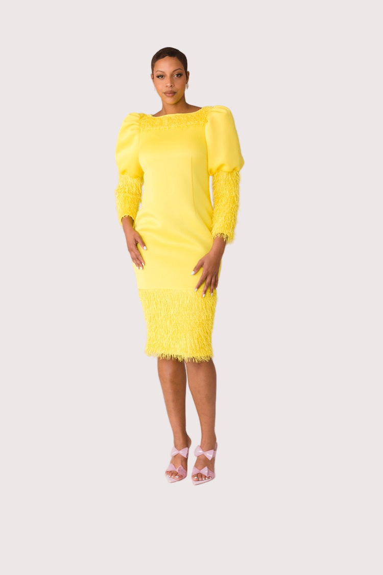 Yellow fringe midi dress shown front standing pose, bold color and statement sleeve detail, For Her NYC