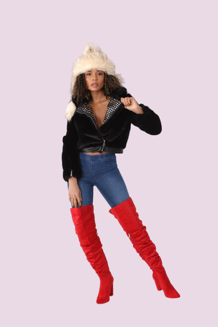 Black faux fur jacket with studded lapel shown in an alternate front full-length pose, highlighting the cropped silhouette, studded lapel detail, and soft faux fur texture by For Her NYC