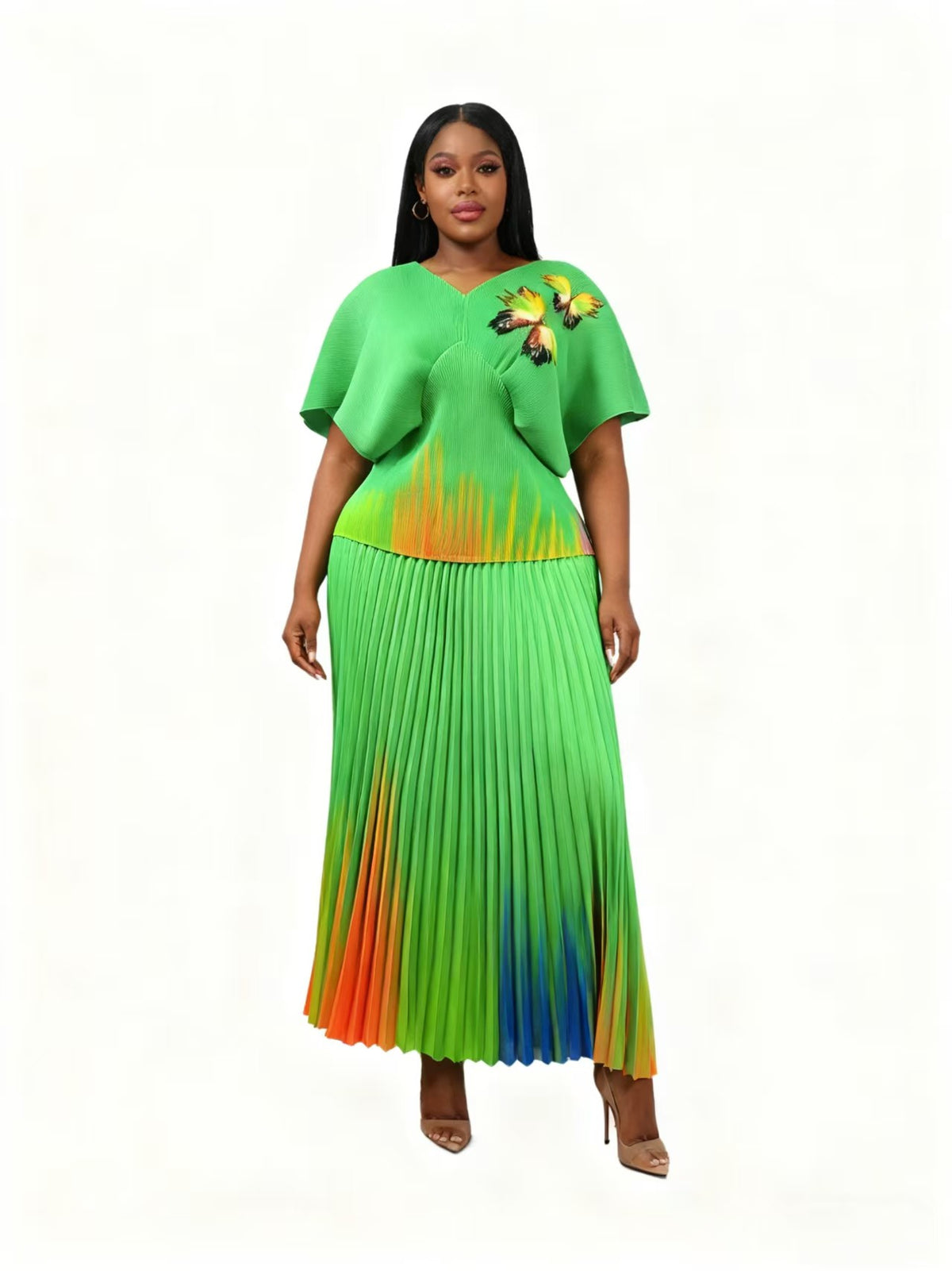 Front view of model wearing a green multi gradient pleated skirt set with relaxed fit top and soft pleated skirt, For Her NYC