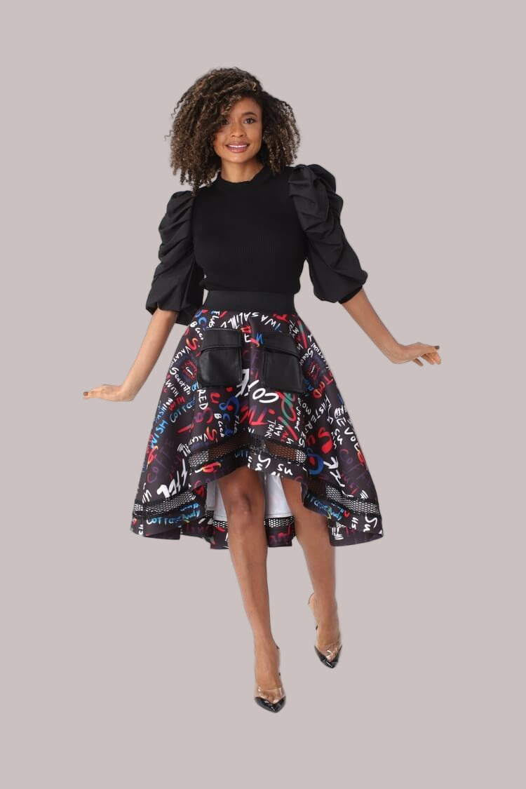 Front motion pose highlighting the flared silhouette, graphic print, and layered netting detail of the scuba skirt by For Her NYC