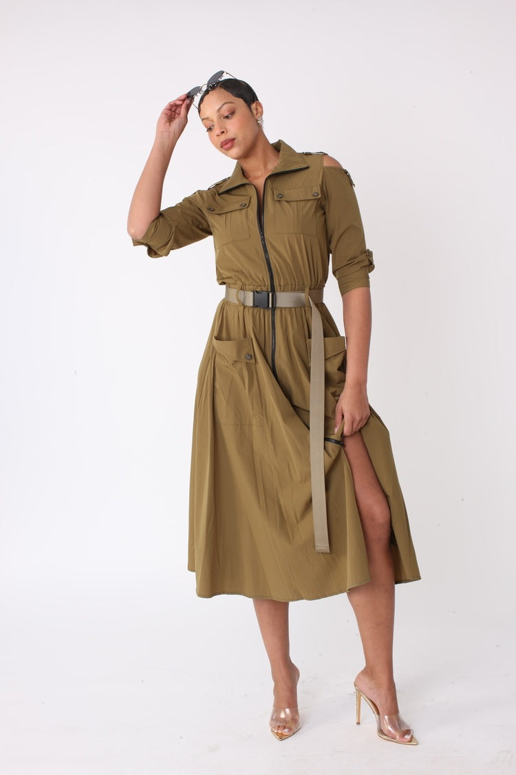 Khaki midi dress shown front view with model hand on head pose, relaxed yet polished styling, For Her NYC