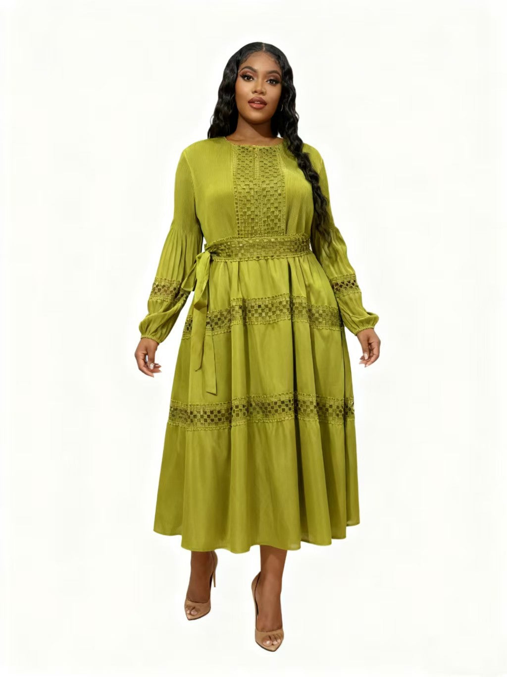Front view of model wearing a green long sleeve tiered midi dress with lace trim and flowing layered skirt, For Her NYC