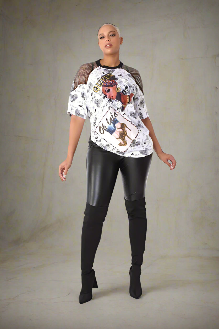 Model wearing black faux leather pants, forward step pose highlighting slim fit, high-shine finish, and confident city styling by For Her NYC