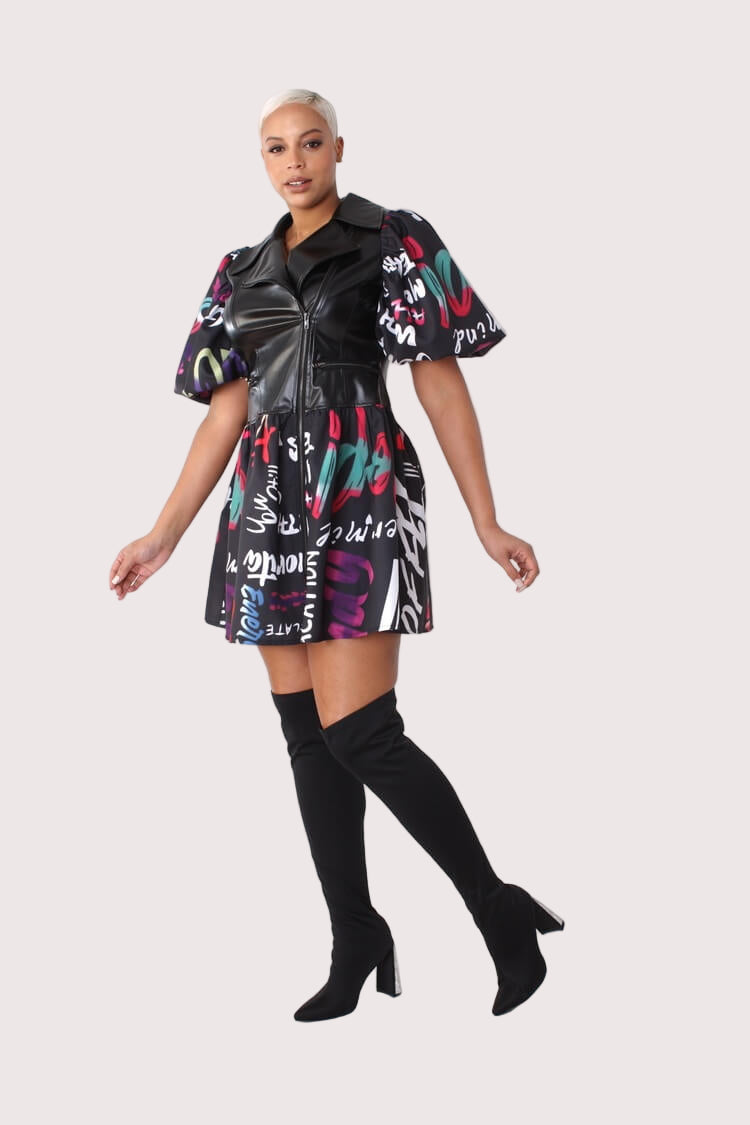 Side angle view of black multi printed dress with faux leather puff sleeves – For Her NYC