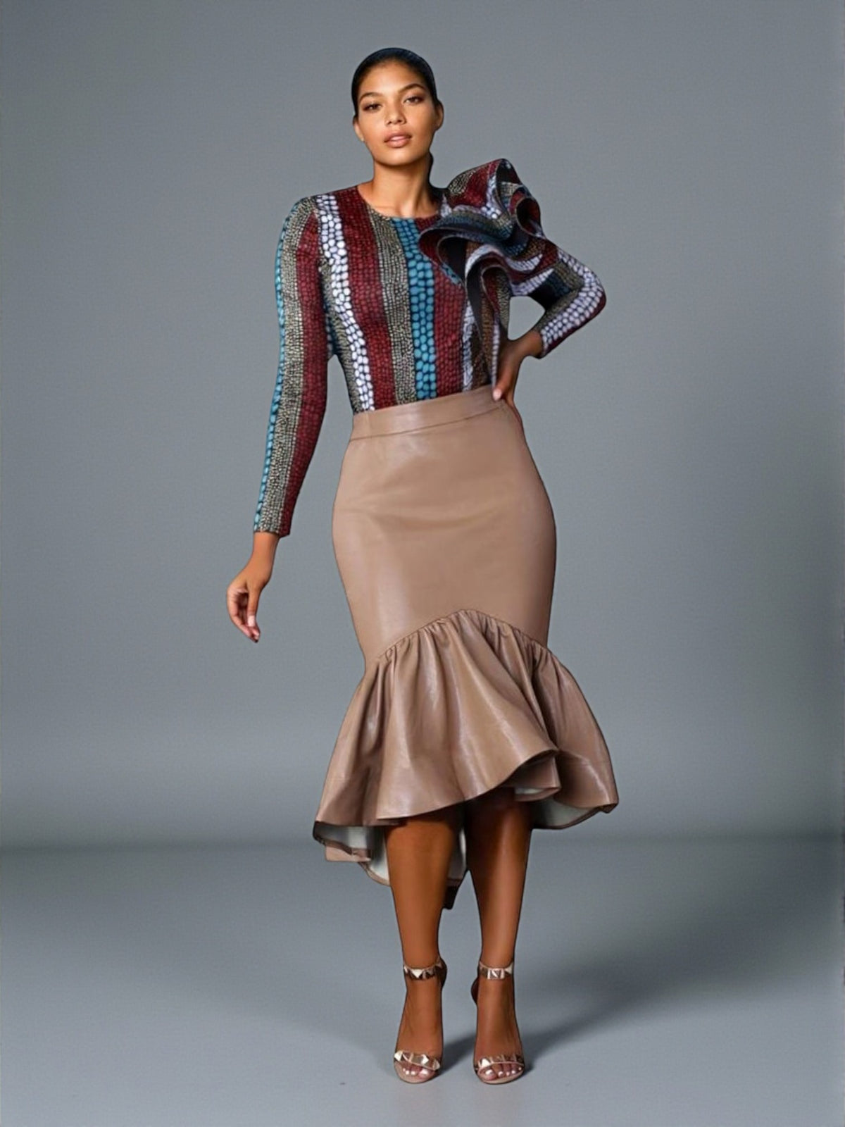 Nude beige faux leather ruffle midi skirt front studio pose.