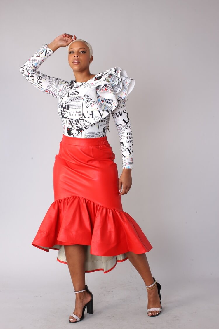 Red faux leather ruffle midi skirt front full body pose.