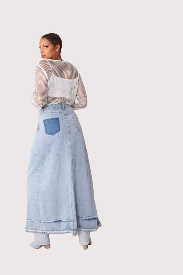 Back view of light wash long denim skirt showing clean back fit and full-length silhouette, For Her NYC