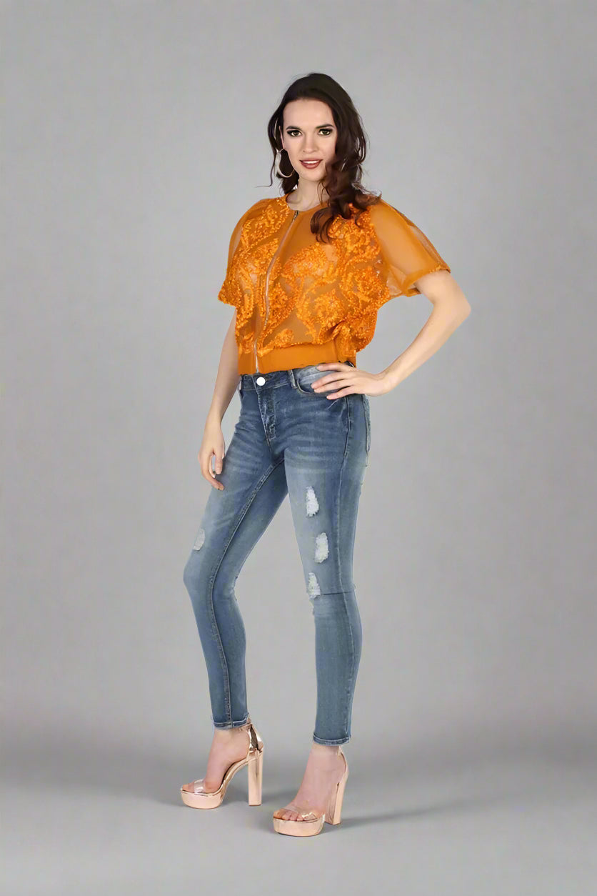 Mustard mesh bomber jacket front pose showcasing sheer mesh construction and trendy statement look.