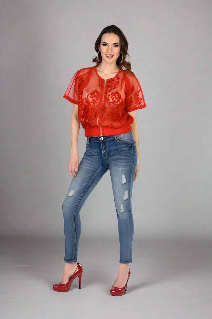 Red mesh bomber jacket front view showing short sleeves, sheer sporty mesh fabric, and edgy streetwear style.