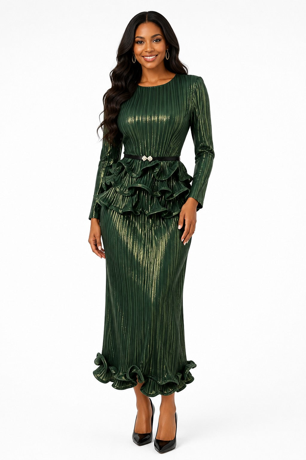 Model wearing the Green Metallic Ruffle Pleated Skirt Set featuring a shimmering long-sleeve top, dramatic layered ruffle peplum, embellished belt, and flowing pleated midi skirt by For Her NYC.