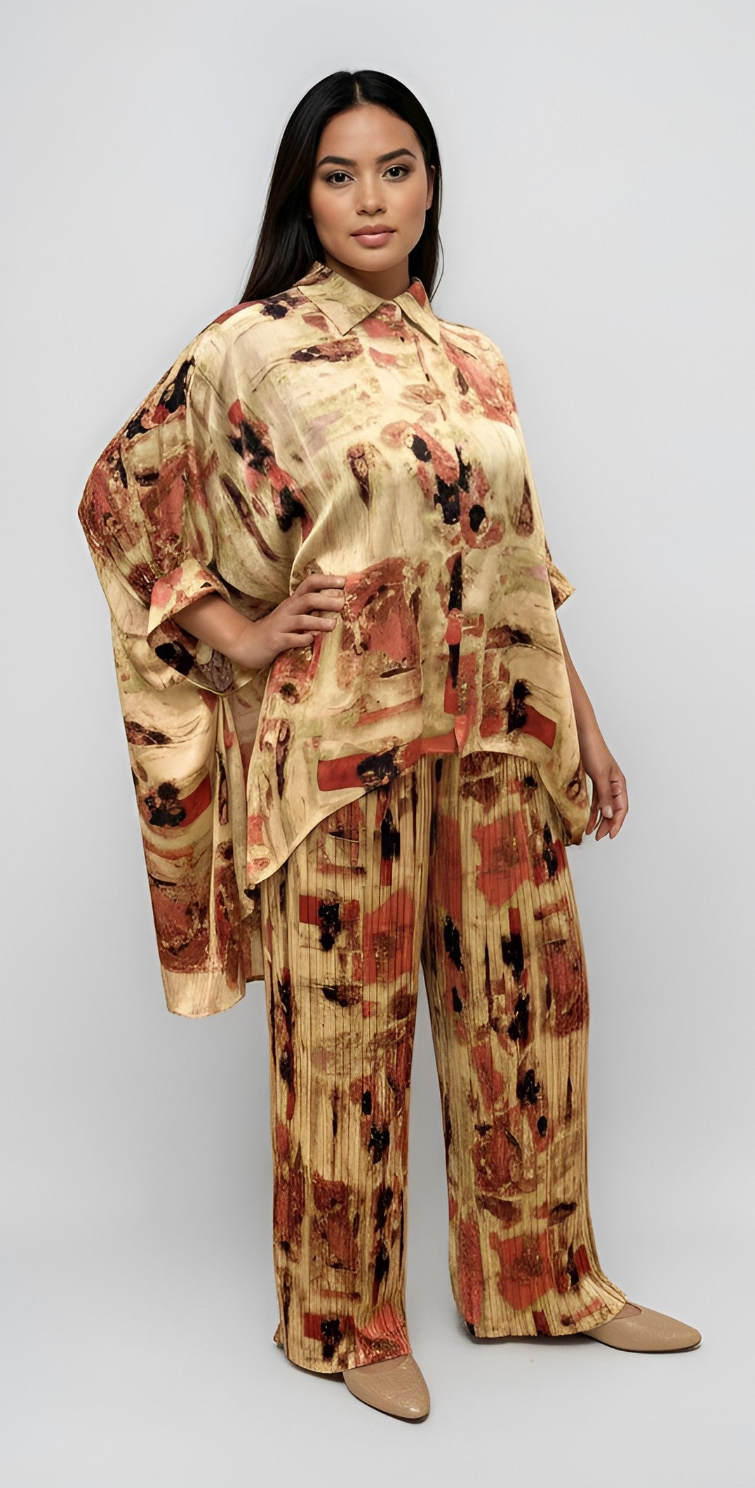 Model wearing multi abstract print lounge 2-piece pant set with relaxed top and wide leg pants.