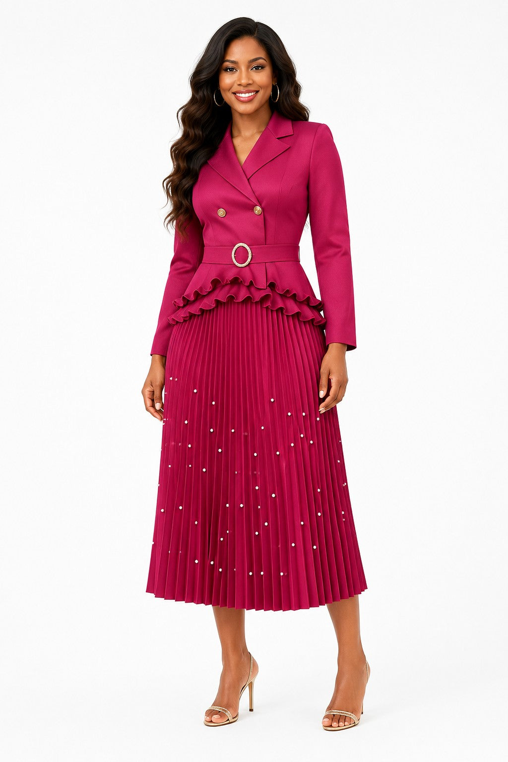 Model wearing the Rose Pearl Trim Pleated Skirt Set featuring a structured double-breasted jacket with pearl trim, a ruffled peplum, coordinating belt, and a flowing pleated midi skirt by For Her NYC.