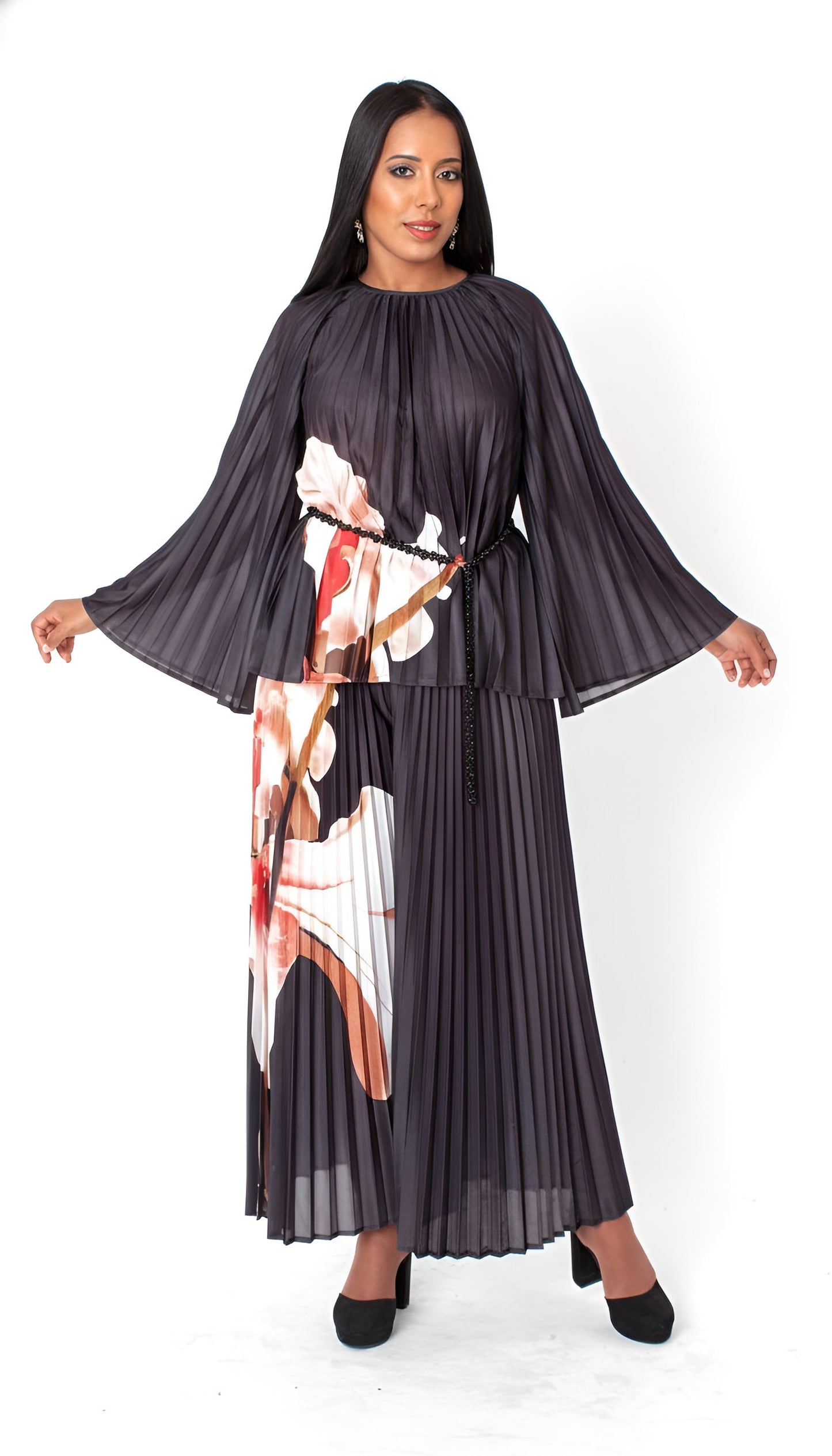 Front view of black petal pleated wide-leg pantset with bold floral petal print and wide sleeves, For Her NYC