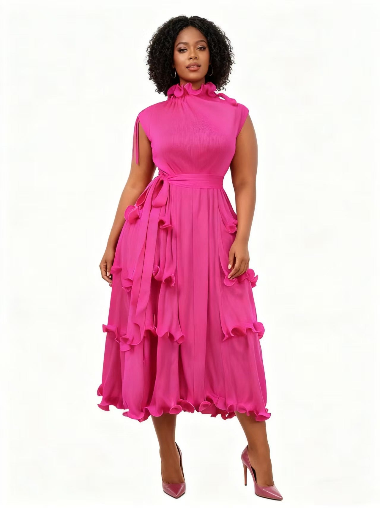 Front view of model wearing a raspberry pink tiered midi dress with flowing skirt and ruffle accents, For Her NYC