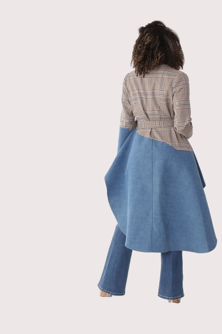 Back view of plaid high-low blazer with dramatic denim cascading tail, styled with jeans – For Her NYC