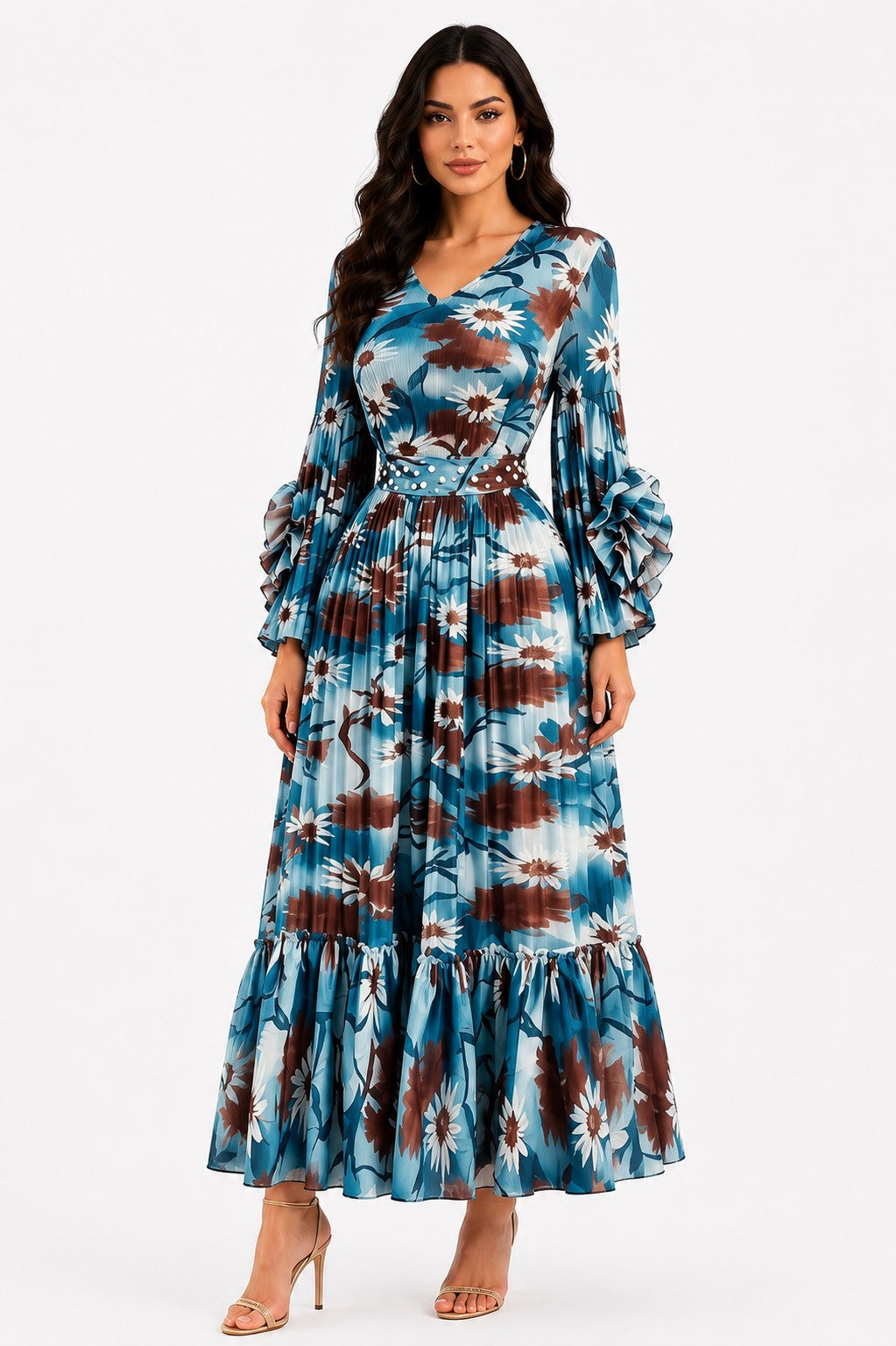 Model wearing the Printed Tiered Pleated Maxi Dress in Teal with an eye-catching abstract print, tiered pleats, long sleeves, and an elegant maxi-length silhouette by For Her NYC Teal