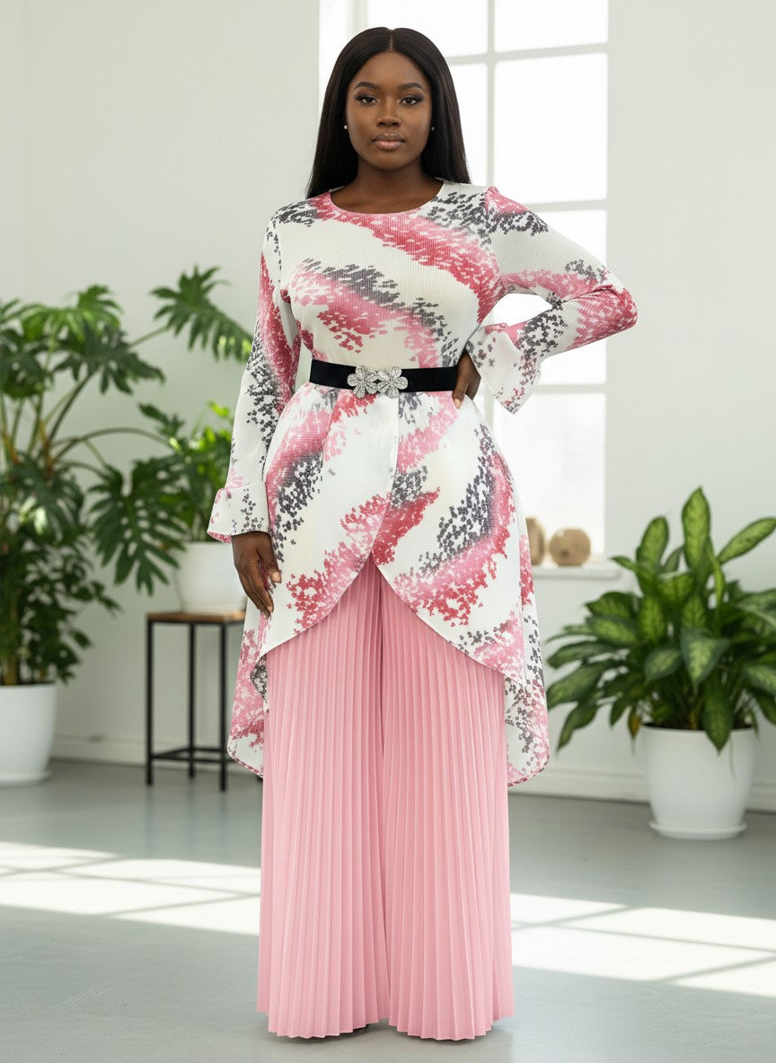 Front view of model wearing pink multi printed tunic top with pleated wide-leg pants, For Her NYC