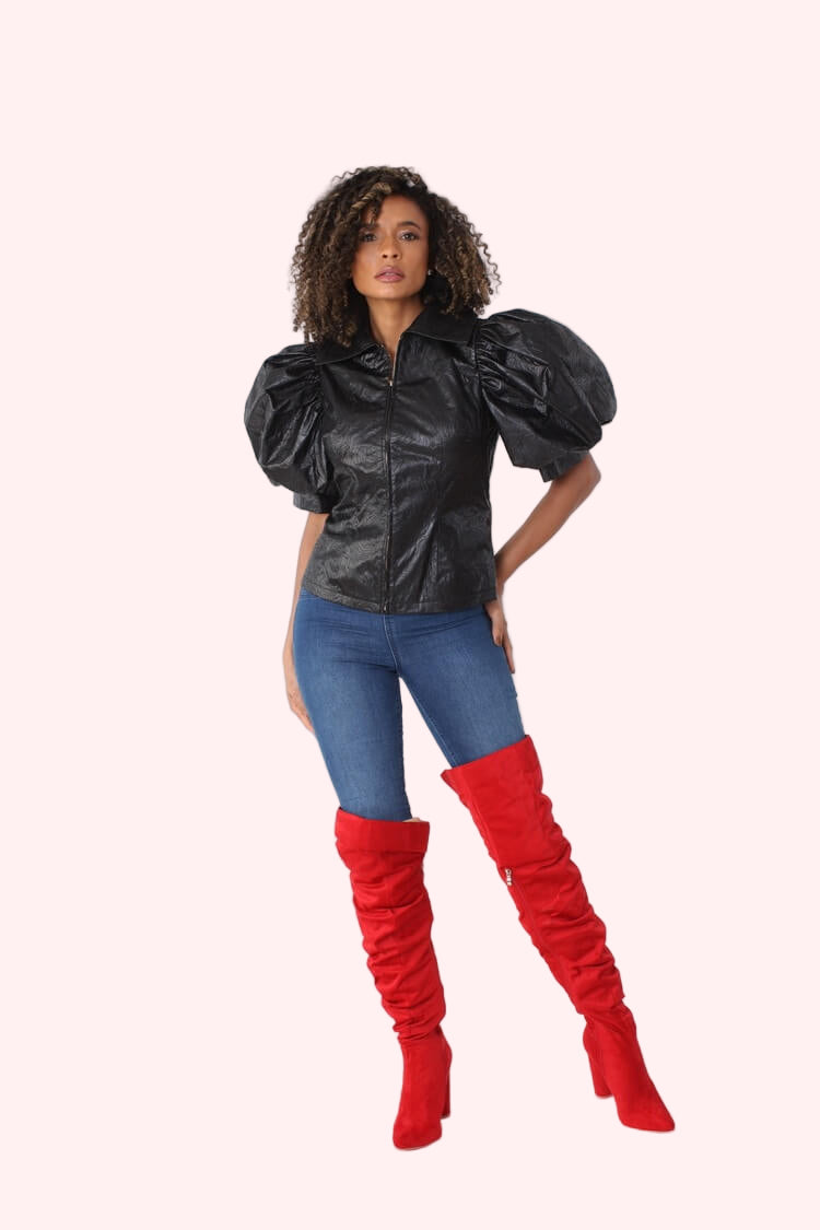 Black puff sleeve faux leather jacket front view with confident stance and dramatic puff sleeves by For Her NYC