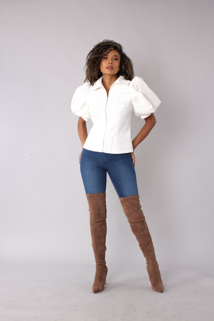 White puff sleeve faux leather jacket shown front view with relaxed stance and fitted silhouette by For Her NYC