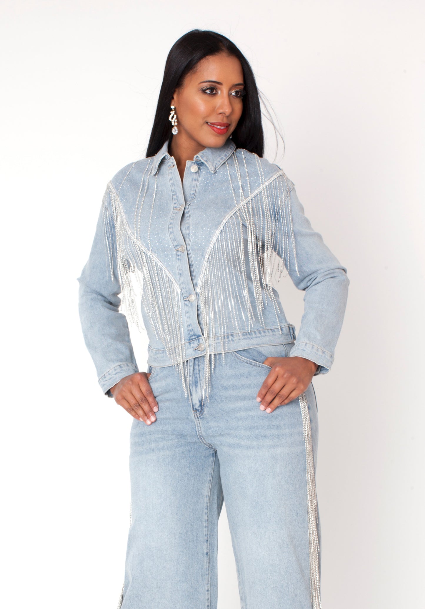 Wash blue denim rhinestone fringe jacket with cascading sparkle fringe detail, front full view styled as a statement piece by For Her NYC