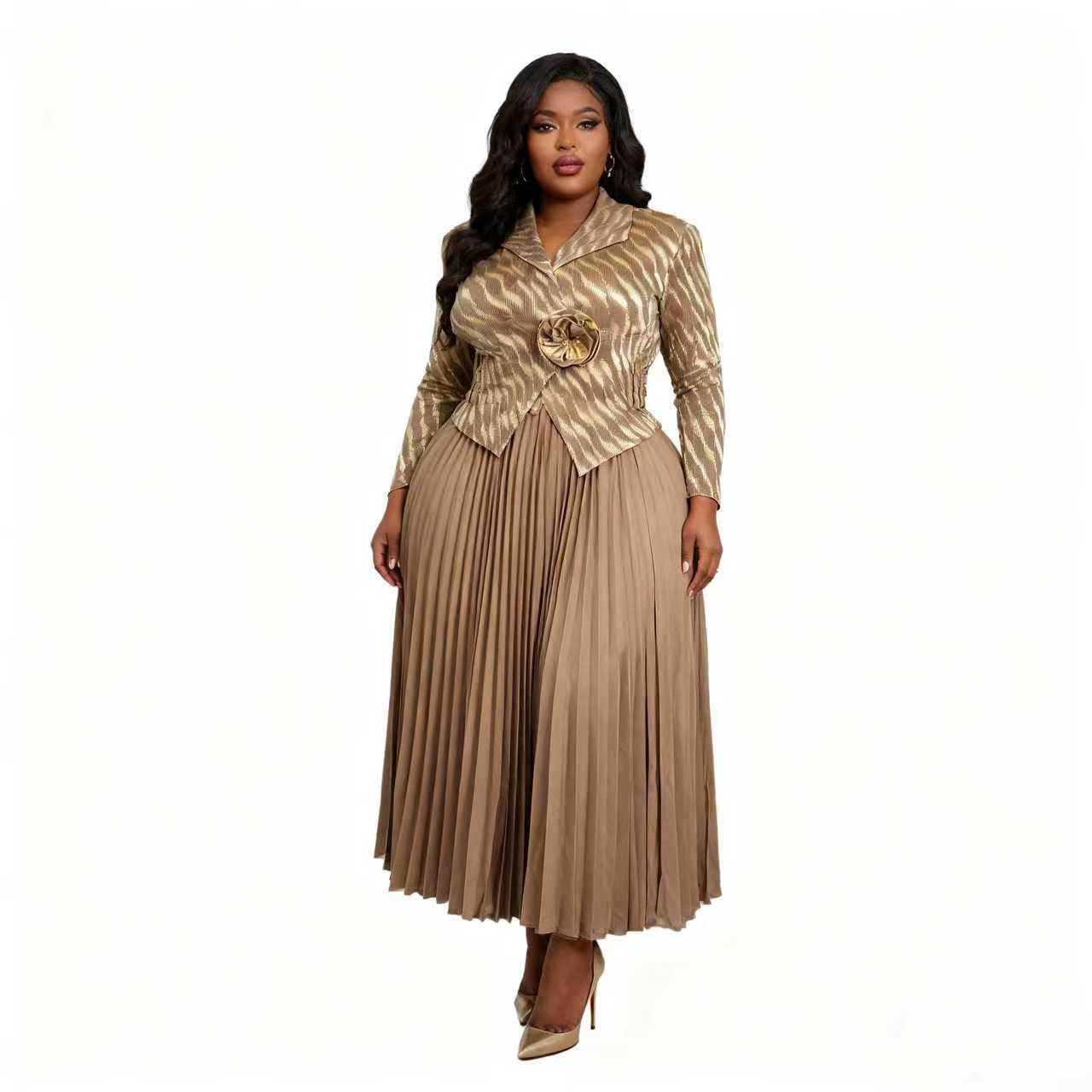 Brown multi rhombus pleated skirt suit with sculpted waist jacket and flowing pleated skirt, model standing front, For Her NYC