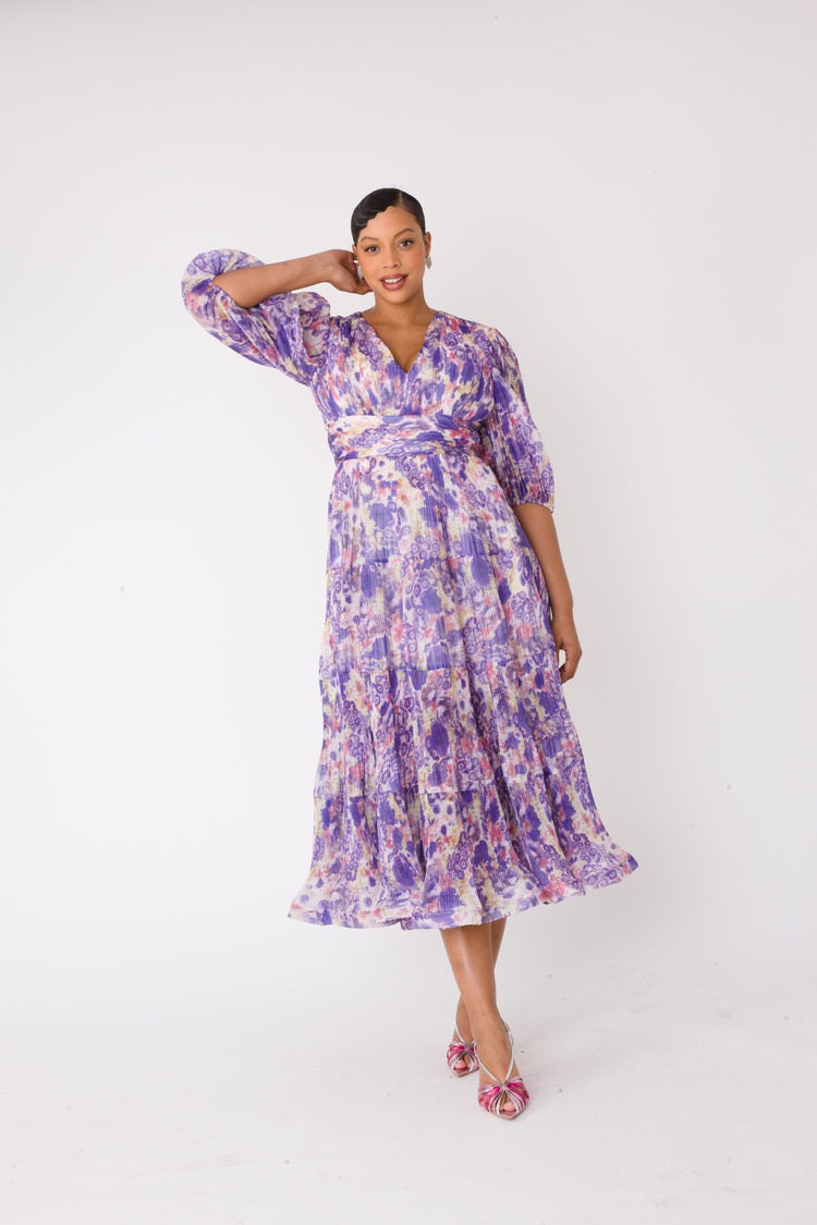 Purple multi tiered maxi dress showing movement and flow.