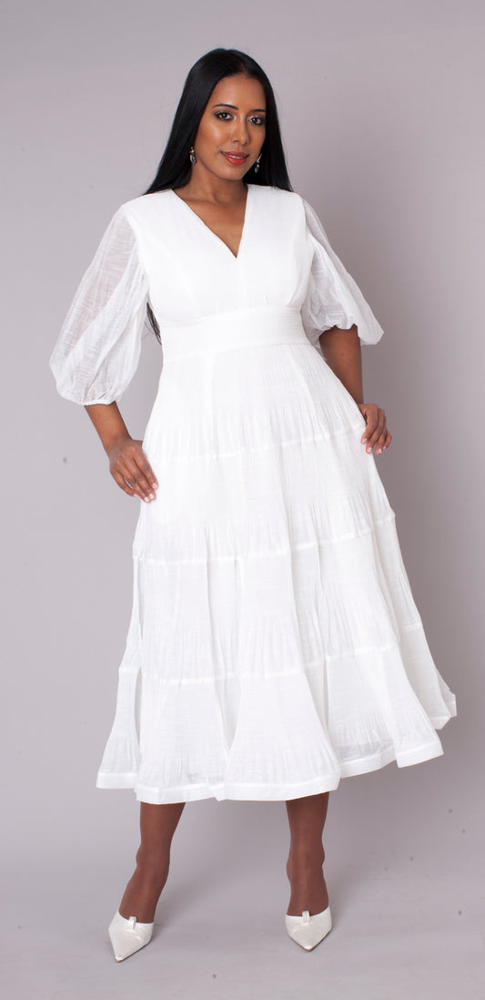 White tiered maxi dress in motion perfect for special occasions